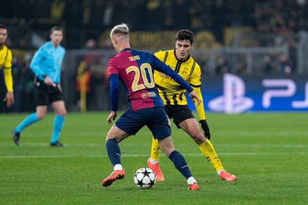 GER, Champions League, Borussia Dortmund vs FC Barcelona 11 12 2024, SIgnal Iduna Park, Dortmund, GER, Champions League, Borussia Dortmund vs FC Barcelona In the picture duel between Dani Olmo FC Barcelona, 20 and Giovanni Reyna Borussia Dortmund, 7 nordphotoxGmbHxx xChristianxSchulze nph000300