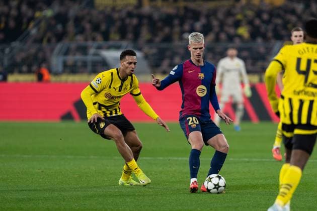 GER, Champions League, Borussia Dortmund vs FC Barcelona 11 12 2024, SIgnal Iduna Park, Dortmund, GER, Champions League, Borussia Dortmund vs FC Barcelona In the picture duel between Dani Olmo FC Barcelona, 20 and Felix Nmecha Borussia Dortmund, 8 nordphotoxGmbHxx xChristianxSchulze nph000300