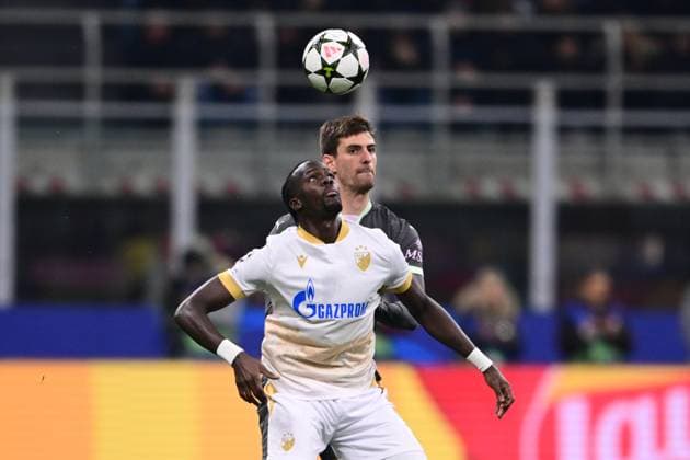 AC Milan v FK Crvena Zvezda - UEFA Champions League 2024 25 League Phase MD6 Cherif Ndiaye of FK Crvena Zvezda and Matteo Gabbia of AC Milan battle for the ball during the UEFA Champions League match between AC Milan and FK Crvena Zvezda at Giuseppe Meazza in Milan, Italy, on December 11, 2024. Milan Italy  Copyright: xAndreaxDiodatox originalFilename:diodato-acmilanv241211_npk2H.jpg