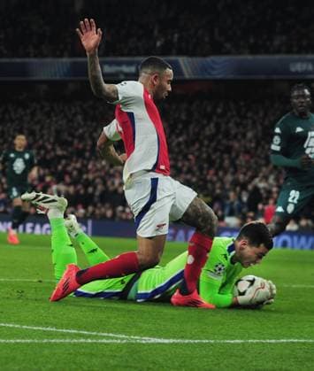 Football - 2024 2025 UEFA Champions League - League Phase - Matchday 6 of 8 - Arsenal vs Monaco - Emirates Stadium - Wednesday 11th December 2024 Gabriel Jesus of Arsenal is foiled by goalkeeper, Radoslaw Majecki 