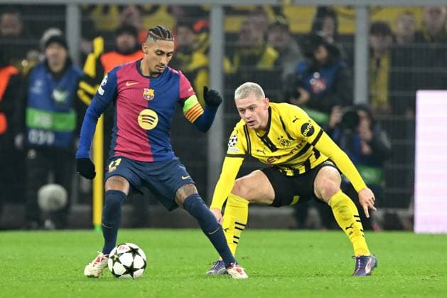DORTMUND - (l-r) Raphinha of FC Barcelona, Barca Julian Ryerson of Borussia Dortmund during the UEFA Champions league match between Borussia Dortmund and FC Barcelona at the Signal Iduna Park on Dec. 11, 2024 in Dortmund, Germany. ANP Hollandse Hoogte UEFA Champions League 2024 25 League phase 6 2024 25 xVIxANPxSportx xGerritxvanxKeulenxIVx 515488080 originalFilename: 515488080.jpg