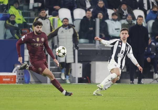 Josko Gvardiol of Manchester City and Francisco Conceicao of Juventus FC during the Uefa Champions League 2024 25, football match between Juventus FC and Manchester City, on 11 December 2024, at Allianz Stadium Turin Italy. Photo Nderim Kaceli  Copyright: xNderimxKaceli IPAxSportx xipa-agency.netx xx IPA_52322359 IPA_Agency_IPA52322359