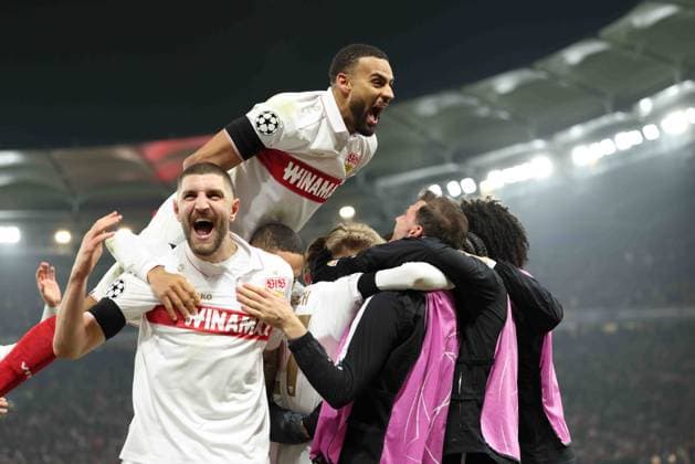 11 12 2024, Germany, Stuttgart, Football Champions League, VfB Stuttgart vs Young Boys Bern, f l Jeff Chabot VfB Josha Vagnoman VfB cheer after scoring the goal for 3 1