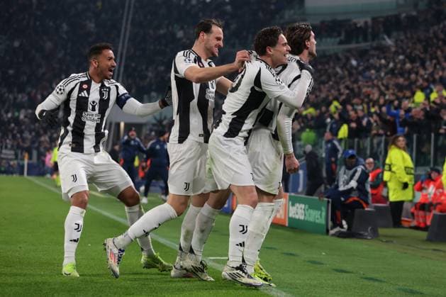 Turin, Italy, 11th December 2024. Dusan Vlahovic of Juventus celebrates with team mates after scoring to give the side a 1-0 lead during the UEFA Champions League match at Juventus Stadium, Turin. Picture credit should read: Jonathan Moscrop Sportimage EDITORIAL USE ONLY. No use with unauthorised audio, video, data, fixture lists, club league logos or live services. Online in-match use limited to 120 images, no video emulation. No use in betting, games or single club league player publications. SPI-3517-0022