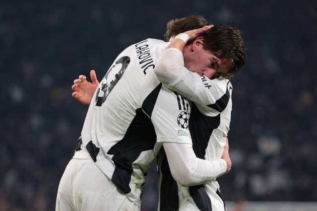 Turin, Italy, 11th December 2024. Dusan Vlahovic of Juventus celebrates with team mate Francisco Conceicao after scoring to give the side a 1-0 lead during the UEFA Champions League match at Juventus Stadium, Turin. Picture credit should read: Jonathan Moscrop Sportimage EDITORIAL USE ONLY. No use with unauthorised audio, video, data, fixture lists, club league logos or live services. Online in-match use limited to 120 images, no video emulation. No use in betting, games or single club league player publications. SPI-3517-0032