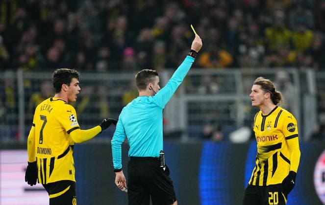 December 11 2024: Marcel Sabitzer of Borussia Dortmund receives a yellow card during a Champions League Round 6 game, BvB Dortmund v FC Barcelona, Barca at Signal Luna Park, Dortmund, Germany. CSM Dortmund Germany - ZUMAc04_ 20241211_zma_c04_051 Copyright: xUlrikxPedersenx