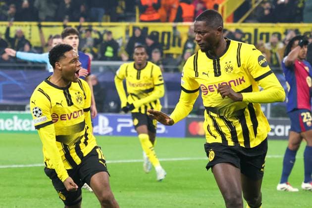 Dortmund, Germany 11 December 2024 Champions League 2024 2025 Borussia Dortmund vs FC Barcelona In the picture from left the second scorer Serhou Guirassy BVB cheers after his goal to 1 1 with Julien Duranville BVB Signal Iduna Park Nordrhein Westfalen Copyright: xFotostandx xFantinix