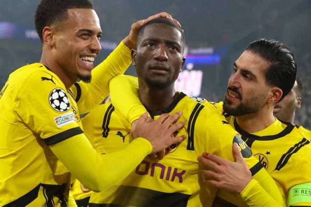 Bilder des Jahres 2024, Sport 12 Dezember Sport Themen der Woche KW50 Sport Bilder des Tages Dortmund, Deutschland 11. Dezember 2024: Champions League - 2024 2025 - Borussia Dortmund vs. FC Barcelona, Barca Im Bild: v.li. der Zweite Torschütze Serhou Guirassy (BVB) jubelt nach seinem Tor zum 1:1 mit Emre Can (BVB), rechts im Bild, und Felix Nmecha (BVB), links im Bild Signal Iduna Park Nordrhein Westfalen *** Dortmund, Germany 11 December 2024 Champions League 2024 2025 Borussia Dortmund vs FC Barcelona In the picture from left the second scorer Serhou Guirassy BVB cheers after his goal to 1 1 with Emre Can BVB , right in the picture, and Felix Nmecha BVB , left in the picture Signal Iduna Park Nordrhein Westfalen Copyright: xFotostandx xFantinix