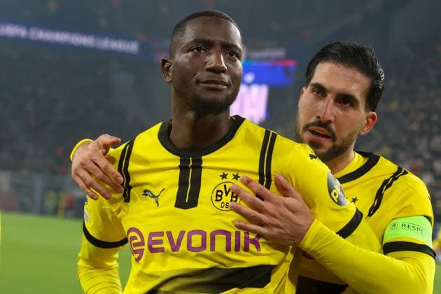 Dortmund, Germany 11 December 2024 Champions League 2024 2025 Borussia Dortmund vs FC Barcelona In the picture from left the second scorer Serhou Guirassy BVB celebrates after his goal to 1 1 with Emre Can BVB Signal Iduna Park Nordrhein Westfalen Copyright: xFotostandx xFantinix