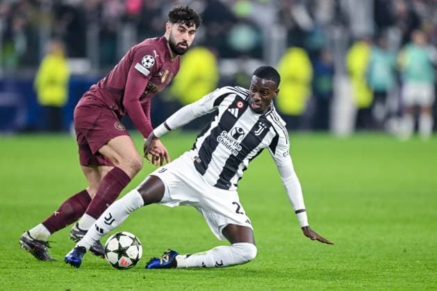 Josko Gvardiol Manchester City and Timothy Weah Juventus battle for the ball during the UEFA Champions League 2024 25 League Phase MD6 match between Juventus and Manchester City at Allianz Stadium on December 11, 2024 in Turin, Italy Defodi 541 JUVMAN20241211 106 Defodi-541