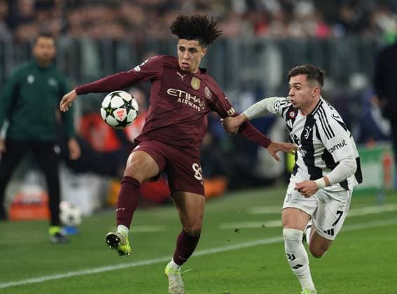 (241212) -- TURIN, Dec. 12, 2024 -- Manchester City s Rico Lewis (L) vies with Juventus Francisco Conceicao during the UEFA Champions League match between Juventus and Manchester City in Turin, Italy, Dec. 11, 2024. ) (SP)ITALY-TURIN-FOOTBALL-UEFA CHAMPIONS LEAGUE-JUVENTUS VS MANCHESTER CITY LixJing 