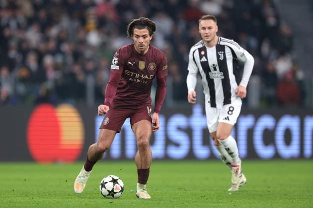 Turin, Italy, 11th December 2024. Teun Koopmeiners of Juventus looks n as Jack Grealish of Manchester City breaks with the ball during the UEFA Champions League match at Juventus Stadium, Turin. Picture credit should read: Jonathan Moscrop Sportimage EDITORIAL USE ONLY. No use with unauthorised audio, video, data, fixture lists, club league logos or live services. Online in-match use limited to 120 images, no video emulation. No use in betting, games or single club league player publications. SPI-3517-0059