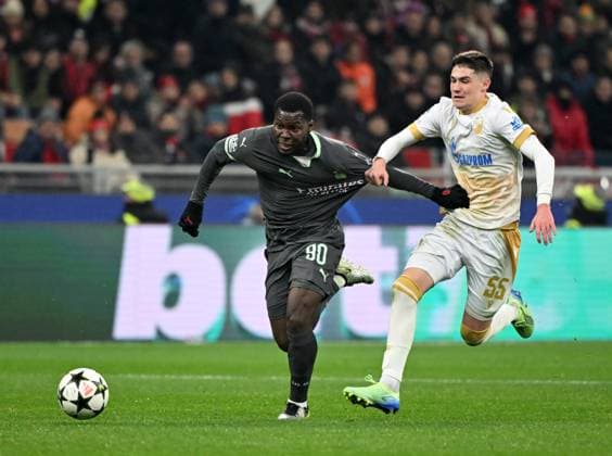 (241212) -- MILAN, Dec. 12, 2024 -- AC Milan s Yunus Musah (L) vies with Crvena Zvezda s Andrija Maksimovic during the UEFA Champions League match between AC Milan and Crvena Zvezda in Milan, Italy, Dec. 11, 2024. (Photo by Alberto Lingria Xinhua) (SP)ITALY-MILAN-FOOTBALL-UEFA CHAMPIONS LEAGUE- AC MILAN VS CRVENA ZVEZDA LixJing 
