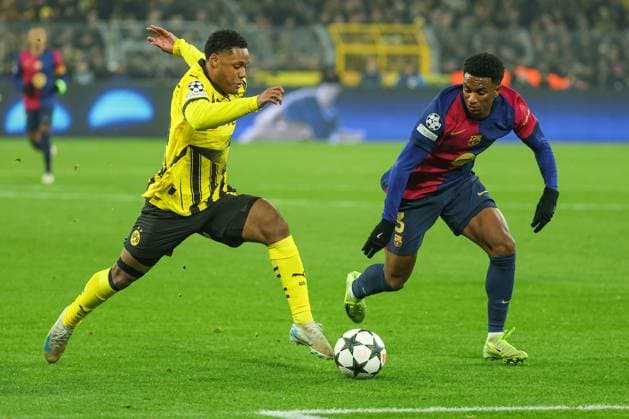 UEFA Champions League Borussia Dortmund FC Barcelona on 11 12 2024 at Signal Iduna Park in Dortmund Pascal Gross Gross Dortmund 13 vs Alejandro Balde Barcelona 3 MH