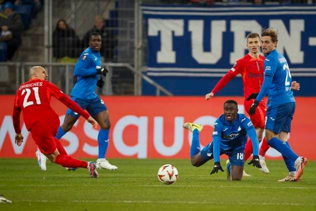 Vlad Chiriches FCSB Bucharest, 21 and Diadie Samassekou TSG Hoffenheim, 18 fighting for the ball , Football, UEFA Europa League, Matchday 6, 2024 2025, TSG Hoffenheim vs FCSB Bucharest, 12 12 2024, Rhein Neckar Arena, Sinsheim, Germany Sinsheim Rhein Neckar Arena Baden Württemberg Germany Copyright: xGrantxHubbsx