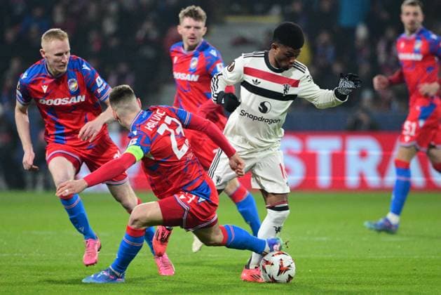 Lukas Kalvach of Plzen, left, and Marcus Rashford of Manchester in action during the football Europa League 6th round match Viktoria Plzen vs Manchester United, ManU in Pilsen, Czech Republic, December 12, 2024. (CTKxPhoto MichalxKamaryt) CTKPhotoP2024121206896  CTKPhotoP2024121206896