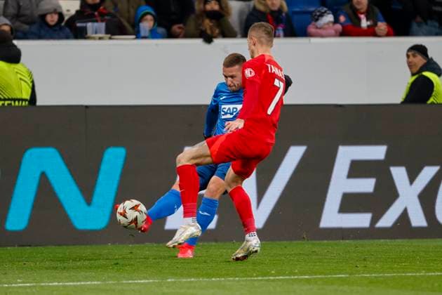Pavel Kaderabek TSG Hoffenheim, 03 and Florin Tanase FCSB Bucharest, 07 in duel , Football, UEFA Europa League, Matchday 6, 2024 2025, TSG Hoffenheim vs FCSB Bucharest, 12 12 2024, Rhein Neckar Arena, Sinsheim, Germany Sinsheim Rhein Neckar Arena Baden Württemberg Germany Copyright: xGrantxHubbsx