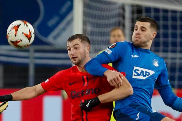 Daniel Popa FCSB Bucharest, 19 and David Jurasek TSG Hoffenheim, 19 fighting for the ball , Football, UEFA Europa League, Matchday 6, 2024 2025, TSG Hoffenheim vs FCSB Bucharest, 12 12 2024, Rhein Neckar Arena, Sinsheim, Germany Sinsheim Rhein Neckar Arena Baden Württemberg Germany Copyright: xGrantxHubbsx