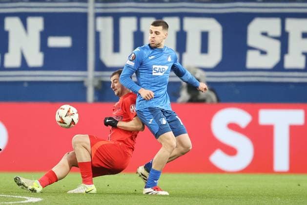 12 12 2024, xtvx, Football UEFA Europa League, TSG 1899 Hoffenheim FCSB Bucharest emspor, v l duel, duel, tackle, compete Daniel Popa FC Steaua Bucharest David Jurasek TSG 1899 Hoffenheim DFL DFB REGULATIONS PROHIBIT ANY USE OF PHOTOGRAPHS as IMAGE SEQUENCES and or QUASI VIDEO Sinsheim