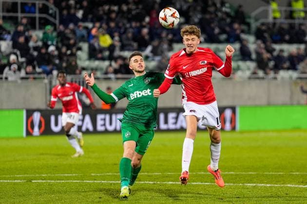 2024-12-12 Ludogorets v AZ Alkmaar - UEFA Europa League 2024 25 League Phase MD6 RAZGRAD, BULGARIA - DECEMBER 12: Denny Gropper of Ludogorets and Sven Mijnans of AZ battle for possession during a UEFA Europa League 2024 25 League Phase MD6 match between Ludogorets and AZ Alkmaar at Huvepharma Arena on December 12, 2024 in Razgrad, Bulgaria. Razgrad Huvepharma Arena Bulgaria Content not available for redistribution in The Netherlands directly or indirectly through any third parties. Copyright: xEdxvanxdexPolx