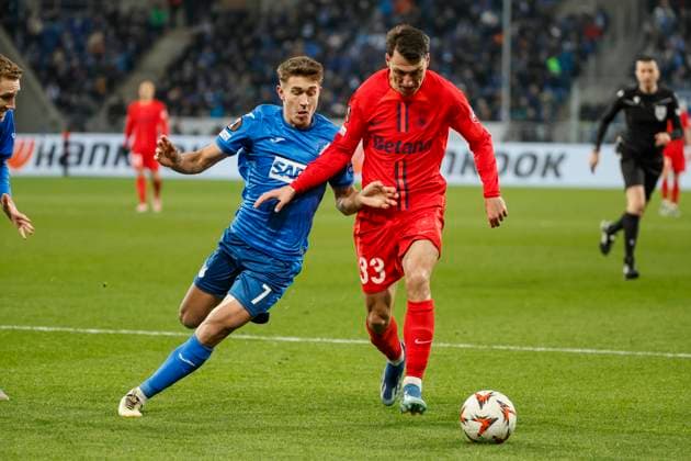 Tom Bischof TSG Hoffenheim, 07 and Risto Radunovic FCSB Bucharest, 33 in duel , Football, UEFA Europa League, Matchday 6, 2024 2025, TSG Hoffenheim vs FCSB Bucharest, 12 12 2024, Rhein Neckar Arena, Sinsheim, Germany Sinsheim Rhein Neckar Arena Baden Württemberg Germany Copyright: xGrantxHubbsx