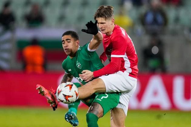 2024-12-12 Ludogorets v AZ Alkmaar - UEFA Europa League 2024 25 League Phase MD6 RAZGRAD, BULGARIA - DECEMBER 12: Erick Marcus of Ludogorets and David Moller Wolfe of AZ battle for possession during a UEFA Europa League 2024 25 League Phase MD6 match between Ludogorets and AZ Alkmaar at Huvepharma Arena on December 12, 2024 in Razgrad, Bulgaria. Razgrad Huvepharma Arena Bulgaria Content not available for redistribution in The Netherlands directly or indirectly through any third parties. Copyright: xEdxvanxdexPolx