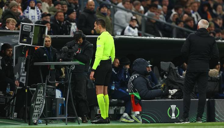 Referee Andrea Colombo checks the VAR screen before awarding Copenhagen a penalty for a foul by Craig Gordon of Heart of Midlothian FC Copenhagen v Heart of Midlothian, UEFA Conference League, Group Stage, Football, Parken Stadium, Copenhagen, Denmark - 12 Dec 2024 EDITORIAL USE ONLY No use with unauthorised audio, video, data, fixture lists, club league logos or live services. Online in-match use limited to 120 images, no video emulation. No use in betting, games or single club league player publications. Copyright: xKieranxMcManus Shutterstockx 14985101at