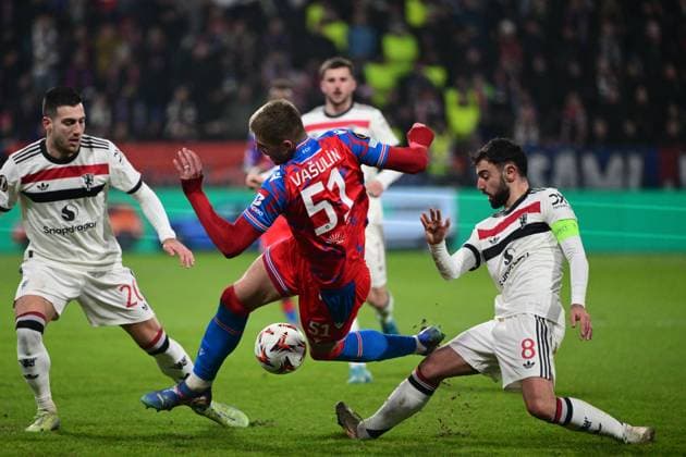 (L-R) Alejandro Garnacho of Manchester, Daniel Vasulin of Plzen and Bruno Fernandes of Manchester in action during the football Europa League 6th round match Viktoria Plzen vs Manchester United, ManU in Pilsen, Czech Republic, December 12, 2024. (CTKxPhoto MichalxKamaryt) CTKPhotoP2024121207614  CTKPhotoP2024121207614