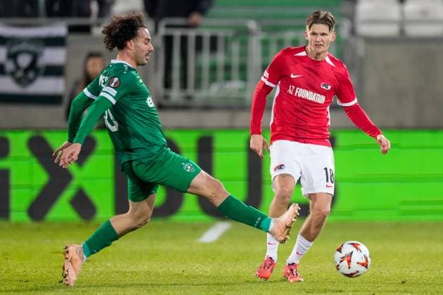 2024-12-12 Ludogorets v AZ Alkmaar - UEFA Europa League 2024 25 League Phase MD6 RAZGRAD, BULGARIA - DECEMBER 12: Pedro Naressi of Ludogorets and David Moller Wolfe of AZ battle for possession during a UEFA Europa League 2024 25 League Phase MD6 match between Ludogorets and AZ Alkmaar at Huvepharma Arena on December 12, 2024 in Razgrad, Bulgaria. Razgrad Huvepharma Arena Bulgaria Content not available for redistribution in The Netherlands directly or indirectly through any third parties. Copyright: xEdxvanxdexPolx