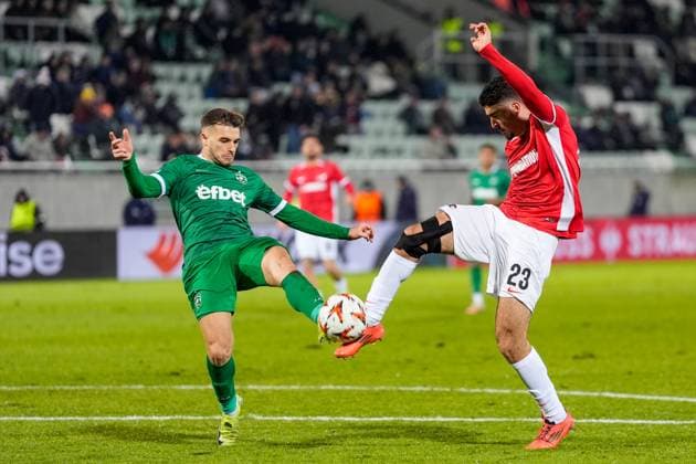 2024-12-12 Ludogorets v AZ Alkmaar - UEFA Europa League 2024 25 League Phase MD6 RAZGRAD, BULGARIA - DECEMBER 12: Denny Gropper of Ludogorets and Mayckel Lahdo of AZ battle for possession during a UEFA Europa League 2024 25 League Phase MD6 match between Ludogorets and AZ Alkmaar at Huvepharma Arena on December 12, 2024 in Razgrad, Bulgaria. Razgrad Huvepharma Arena Bulgaria Content not available for redistribution in The Netherlands directly or indirectly through any third parties. Copyright: xEdxvanxdexPolx