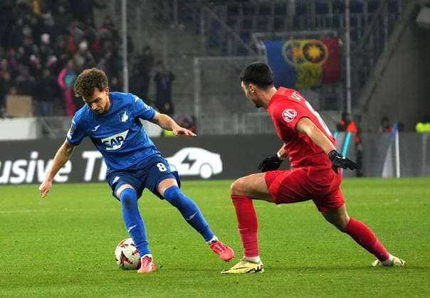 Europa League, TSG 1899 Hoffenheim vs FCSB Bucharest 12 12 2024, PreZero Arena, Sinsheim, Europa League, TSG 1899 Hoffenheim vs FCSB Bucharest , in the picture Dennis Geiger Hoffenheim , Adrian Sut Bucharest nordphotoxGmbHx xBratic nph00250