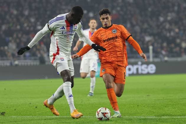 2024 12 12 6 Matchday UEFA Europa League Olympique Lyonnais Eintracht Frankfurt v l , Moussa NiakhatÃ Olympique Lyonnais , Fares Chaibi Eintracht Frankfurt , Duel, Action, Action, Battles for the Ball DFL REGULATIONS PROHIBIT ANY USE OF PHOTOGRAPHS AS IMAGE SEQUENCES AND OR QUASI VIDEO Copyright: JoaquimxFerreira