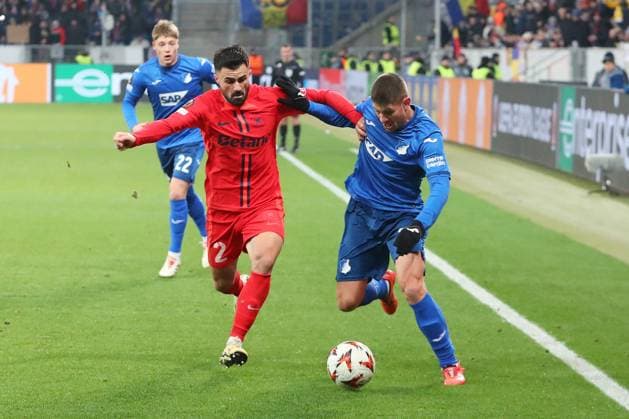 12 12 2024, xtvx, Football UEFA Europa League, TSG 1899 Hoffenheim FCSB Bucharest emspor, v l duel, duel, tackle, compete Valentin Cretu FC Steaua Bucharest Andrej Kramaric TSG 1899 Hoffenheim DFL DFB REGULATIONS PROHIBIT ANY USE OF PHOTOGRAPHS as IMAGE SEQUENCES and or QUASI VIDEO Sinsheim