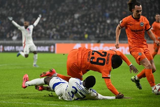 12 12 2024, xjhx, Football UEFA Europa League, Olympique Lyon Eintracht Frankfurt emspor, v l Foul by Niels Nkounkou Eintracht Frankfurt on Ernest Nuamah Olympique Lyon Zweikampf, Aktion, action, battle for the ball DFL DFB REGULATIONS PROHIBIT ANY USE OF PHOTOGRAPHS as IMAGE SEQUENCES and or QUASI VIDEO Lyon