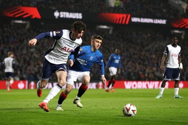 Archie Gray of Tottenham Hotspur and Ridvan Yilmaz of Rangers during the Europa League group phase match at Ibrox Stadium, Glasgow. Rangers v Tottenham Hotspur, UEFA Europa League, Football, Ibrox Stadium, Glasgow, Scotland, UK - 12 Dec 2024 EDITORIAL USE ONLY No use with unauthorised audio, video, data, fixture lists, club league logos or live services. Online in-match use limited to 120 images, no video emulation. No use in betting, games or single club league player publications.  Copyright: xKirkxO Rourke RangersxFC Shutterstockx 14998166v