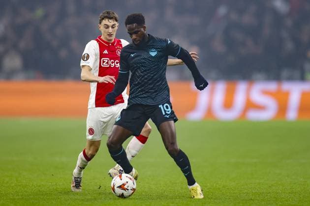 AMSTERDAM, 12-12-2024 , JohanCruyff Arena, Europa League Football, Ajax - Lazio Roma. Lazio Roma player Boulaye Dia and Ajax player Youri Baas Ajax - Lazio Roma  x27001841x Copyright: