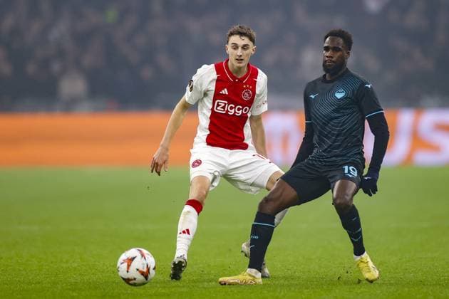 AMSTERDAM, 12-12-2024 , JohanCruyff Arena, Europa League Football, Ajax - Lazio Roma. Lazio Roma player Boulaye Dia and Ajax player Youri Baas Ajax - Lazio Roma  x27001842x Copyright: