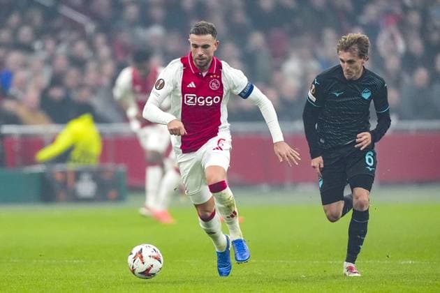 AMSTERDAM, 12-12-2024 , JohanCruyff Arena, Europa League Football, Ajax - Lazio Roma. Ajax player Jordan Henderson and Lazio Roma player Nicolo Rovella Ajax - Lazio Roma  x27001858x Copyright:
