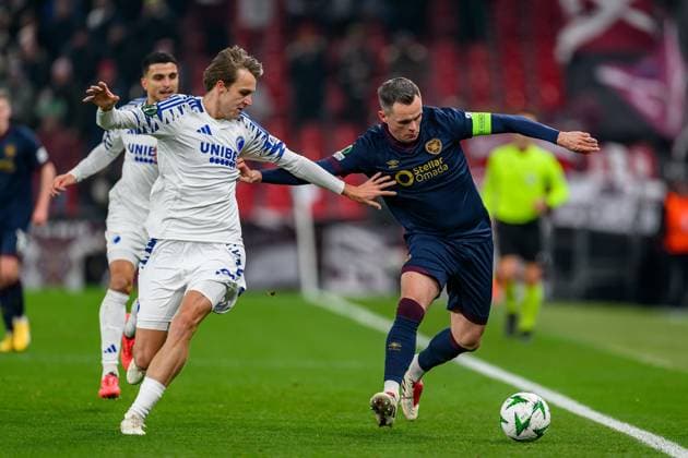 FC Copenhagen v Heart of Midlothian UEFA Conference League 12 12 2024. William Clem of FC Copenhagen tussles with Lawrence Shankland of Hearts during the UEFA Conference League match between FC Copenhagen and Heart of Midlothian at Parken Stadium, Copenhagen, Denmark on 12 December 2024. Editorial use only , Copyright: xMalcolmxMackenzie HeartsxFCx PSI-20987-0005