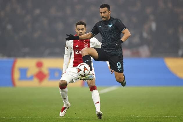 AMSTERDAM - (l-r) Devyne Rensch of Ajax, Pedro Rodriguez of SS Lazio during the UEFA Europa League match between AFC Ajax Amsterdam and SS Lazio Roma at the Johan Cruijff ArenA on Dec. 12, 2024 in Amsterdam, Netherlands. ANP Hollandse Hoogte MAURICE VAN STEEN UEFA Europa League 2024 25 League Phase MD6 2024 25 xVIxANPxSportx xMauricexvanxSteenxIVx 515558591 originalFilename: 515558591.jpg