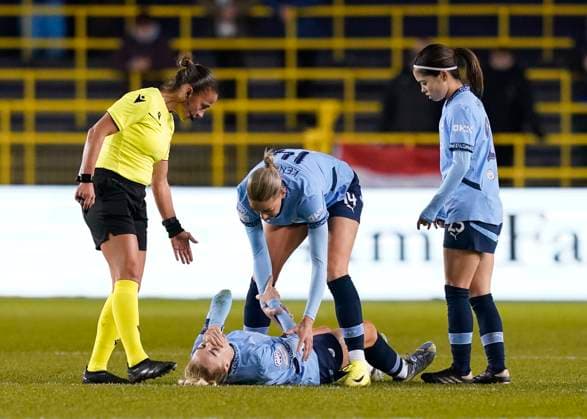 Manchester, England, 12th December 2024. Alex Greenwood of Manchester City looks in distress before being stretchered off during the UEFA Womens Champions League match at the Academy Stadium, Manchester. Picture credit should read: Andrew Yates Sportimage EDITORIAL USE ONLY. No use with unauthorised audio, video, data, fixture lists, club league logos or live services. Online in-match use limited to 120 images, no video emulation. No use in betting, games or single club league player publications. SPI-3522-0007