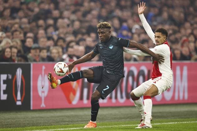 AMSTERDAM - (l-r) Fisayo Dele Bashiru of SS Lazio, Devyne Rensch of Ajax during the UEFA Europa League match between AFC Ajax Amsterdam and SS Lazio Roma at the Johan Cruijff ArenA on Dec. 12, 2024 in Amsterdam, Netherlands. ANP Hollandse Hoogte MAURICE VAN STEEN UEFA Europa League 2024 25 League Phase MD6 2024 25 xVIxANPxSportx xMauricexvanxSteenxIVx 515559723 originalFilename: 515559723.jpg