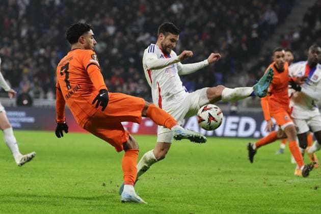 2024 12 12 6 Matchday UEFA Europa League Olympique Lyonnais Eintracht Frankfurt v l , Omar Marmoush Eintracht Frankfurt , Nicolas Tagliafico Olympique Lyonnais , Duel, Action, Action, Battles for the Ball DFL REGULATIONS PROHIBIT ANY USE OF PHOTOGRAPHS AS IMAGE SEQUENCES AND OR QUASI VIDEO Copyright: JoaquimxFerreira