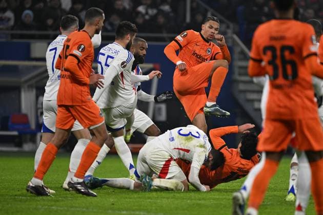 12 12 2024, xjhx, Football UEFA Europa League, Olympique Lyon Eintracht Frankfurt emspor, v l Nicolas Tagliafico Olympique Lyon Hugo Ekitike Eintracht Frankfurt Mahmoud Dahoud Eintracht Frankfurt Zweikampf, Aktion, action, battle for the ball DFL DFB REGULATIONS PROHIBIT ANY USE OF PHOTOGRAPHS as IMAGE SEQUENCES and or QUASI VIDEO Lyon
