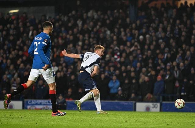 Glasgow, Scotland, 12th December 2024. Dejan Kulusevski of Tottenham Hotspur scores during the UEFA Europa League match at Ibrox Stadium, Glasgow. Picture credit should read: Neil Hanna Sportimage EDITORIAL USE ONLY. No use with unauthorised audio, video, data, fixture lists, club league logos or live services. Online in-match use limited to 120 images, no video emulation. No use in betting, games or single club league player publications. SPI-3523-0039