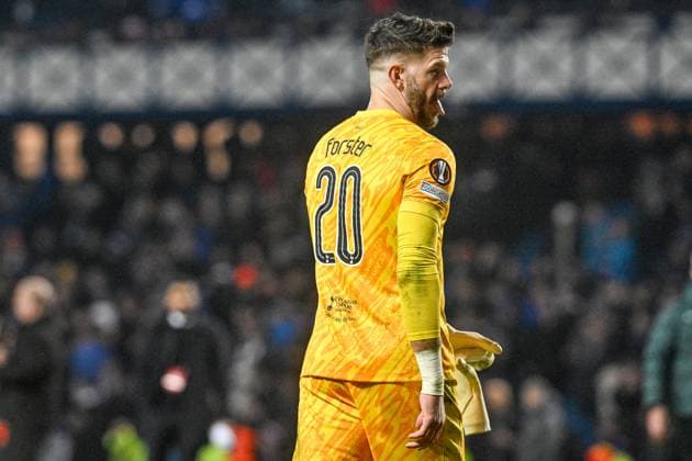 Rangers v Tottenham Hotspur UEFA Europa League Fraser Forster of Tottenham Hotspur sticks his tongue out at fans of Rangers during the UEFA Europa League match at Ibrox Stadium, Glasgow UK Newspapers OUT Copyright: xJamiexJohnstonx FIL-21079-0050