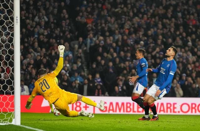 Nedim Bajrami of Rangers reacts after his shot was saved by Tottenham Hotspur goalkeeper Fraser Forster. Rangers v Tottenham Hotspur, UEFA Europa League, Group Stage, Football, Ibrox Stadium, Glasgow, Scotland - 12 Dec 2024 EDITORIAL USE ONLY No use with unauthorised audio, video, data, fixture lists, club league logos or live services. Online in-match use limited to 120 images, no video emulation. No use in betting, games or single club league player publications.  Copyright: xStuartxWallace Shutterstockx 14985154bw