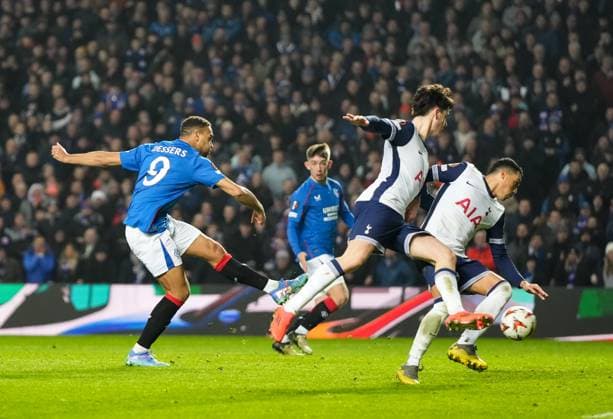 Cyriel Dessers of Rangers shoots at goal. Rangers v Tottenham Hotspur, UEFA Europa League, Group Stage, Football, Ibrox Stadium, Glasgow, Scotland - 12 Dec 2024 EDITORIAL USE ONLY No use with unauthorised audio, video, data, fixture lists, club league logos or live services. Online in-match use limited to 120 images, no video emulation. No use in betting, games or single club league player publications.  Copyright: xStuartxWallace Shutterstockx 14985154co