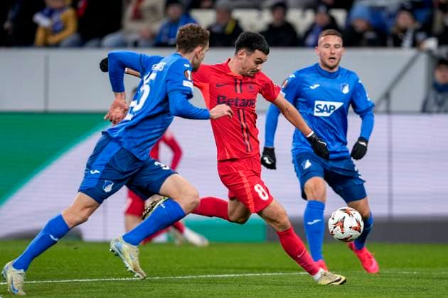v li Arthur Chaves Hoffenheim, 35 , Adrian Sut FCSB Bucharest, 8 , Pavel Kaderabek Hoffenheim, 3 , duel, duel, tackle, tackling, dynamics, action, action, 12 12 2024, Sinsheim Germany , Football, UEFA Europa League, Group stage, TSG 1899 Hoffenheim FCSB Bucharest, 12 12 2024, Sinsheim Germany , Football, UEFA Europa League, Group stage, TSG 1899 Hoffenheim FCSB Bucharest, DFB DFL REGULATIONS PROHIBIT ANY USE OF PHOTOGRAPHS AS IMAGE SEQUENCES AND OR QUASI VIDEO xozx