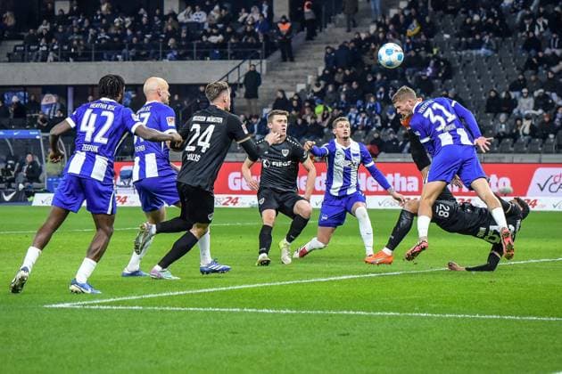 Soccer 2 Bundesliga Hertha BSC Berlin Preußen Münster 13 12 2024, xdanx, Soccer 2 Bundesliga Hertha BSC Berlin Preußen Münster v l Deyovaisio Zeefuik Hertha BSC 42 ,Toni Leistner Hertha BSC 37 ,Niko Koulis SC Preußen Muenster 24 ,Marton Dardai Hertha BSC 31 ,duel, duel, fight, tackle DFL DFB REGULATIONS PROHIBIT ANY USE OF PHOTOGRAPHS as IMAGE SEQUENCES and or QUASI VIDEO Daniel Lakomski Mix1 Berlin Olympiastadion Berlin Berlin Germany EN Copyright: xDanielxLakomskix